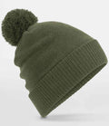 The Beechfield Water Repellent Thermal Snowstar® Beanie by Beechfield features a plain olive green design with a folded brim and large pom-pom, crafted from soft polyester micro fleece, set against a light gray background.