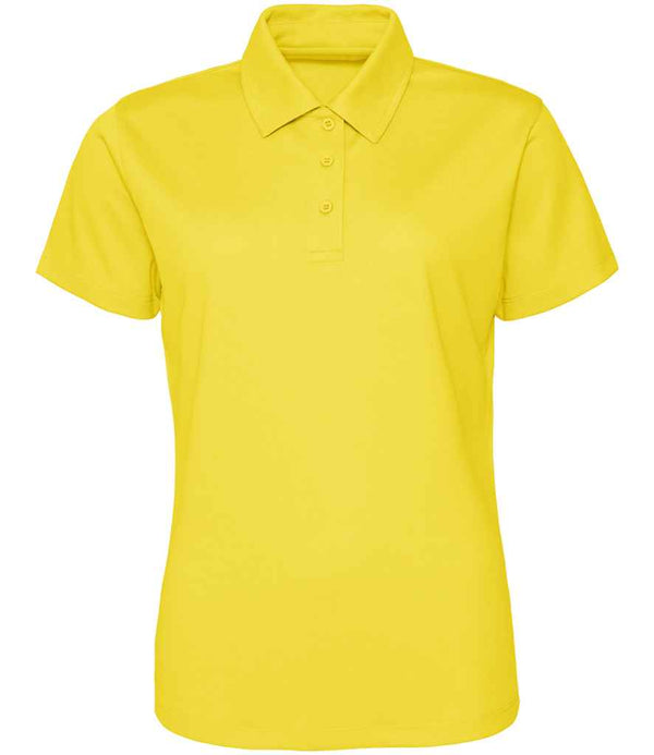 The Just Cool AWDis Ladies Cool Polo Shirt is a plain yellow, short-sleeve collared top with three buttons, made from recycled polyester for eco-friendly style, shown on a white background.