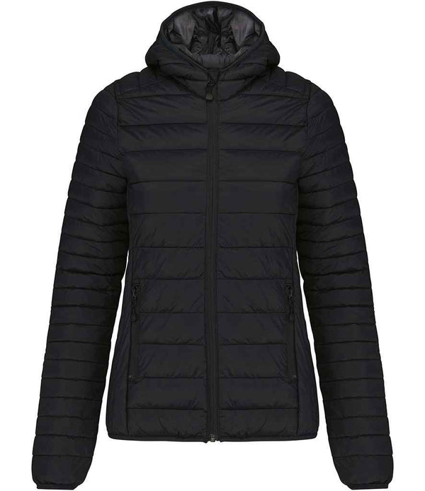The Kariban Ladies Lightweight Hooded Padded Jacket by Kariban is a black, ultra-lightweight puffer with horizontal stitching, polyester padding, front zipper, two zippered side pockets, long sleeves, and hood. Displayed on a plain white background.