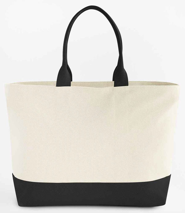 The Quadra Puerto Weekender by Quadra is a 31L cream-colored tote bag with black handles and a black bottom, made from recycled polyester. Its structured design stands upright against a plain white background.