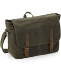 The Quadra Heritage Waxed Canvas Messenger Bag features green canvas with real leather trim, brown straps, a flap closure, adjustable shoulder strap, two front pockets, a top handle, and is laptop compatible. Brand: Quadra.