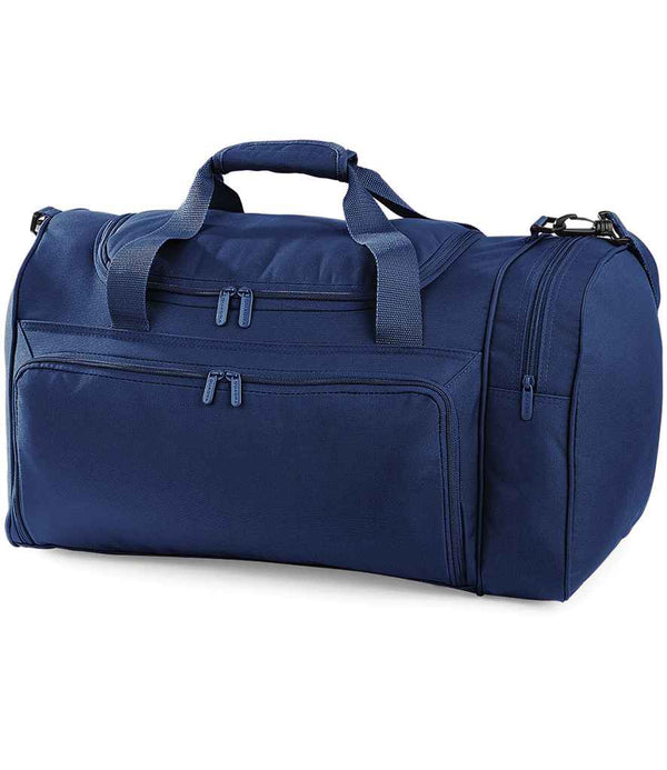 The Quadra Universal Holdall by Quadra is a blue 35L duffel bag made from recycled polyester, featuring two carry handles, an adjustable shoulder strap, and multiple front and side zippered compartments for your essentials.