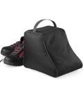The Quadra Hiking Boot Bag by Quadra, featuring a mesh window and top carrying handle, sits in front of partially visible black and red hiking boots against a white background.