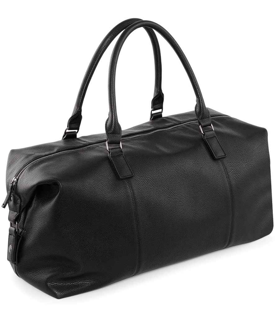 The Quadra NuHide® Weekender by Quadra is a black leather duffel bag with carry/shoulder handles, silver hardware, a side zip pocket, textured surface, main zip compartment, and 30L capacity, shown against a white background.