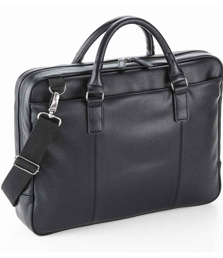 The Quadra NuHide® Slimline Laptop Briefcase by Quadra is a black leather bag with two handles, an adjustable shoulder strap, silver hardware, and a padded tablet compartment, displayed on a white background.