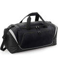 The Quadra Pro Team Jumbo Kit Bag by Quadra is a black and gray duffel made from recycled polyester, with a large main compartment, front zippered pocket, side pockets, double handles, and an adjustable shoulder strap.