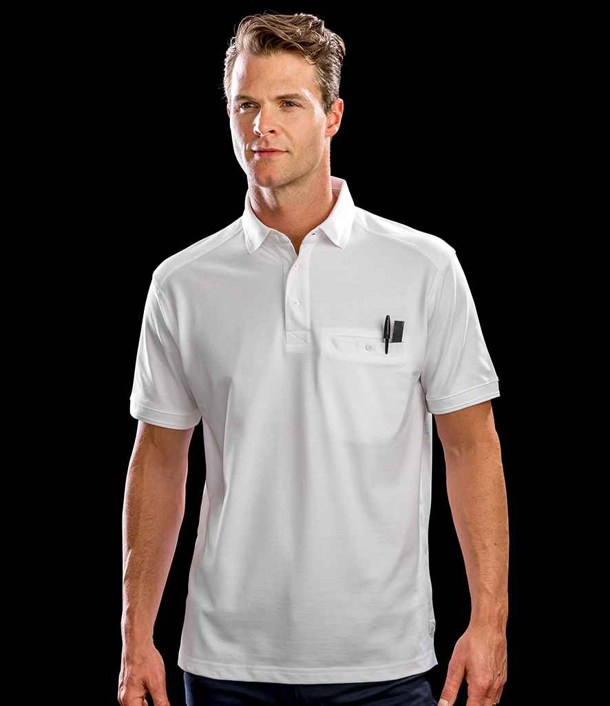 A man in a Result Work-Guard Apex Pocket Piqué Polo Shirt with a flat knit collar and pen in the chest pocket stands against a solid black background.