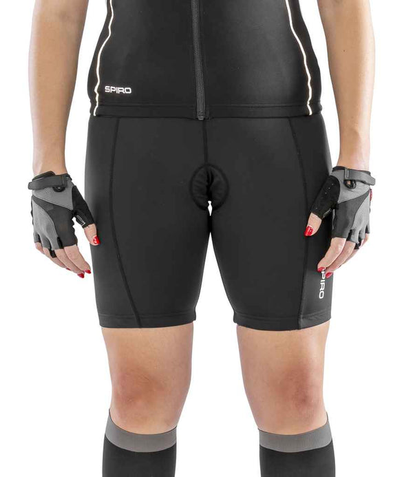 A person wears Spiro Ladies Bikewear Padded Shorts from Spiro, along with a matching jersey, fingerless gloves, and knee-high socks. The image shows only the body from shoulders to knees against a white background.