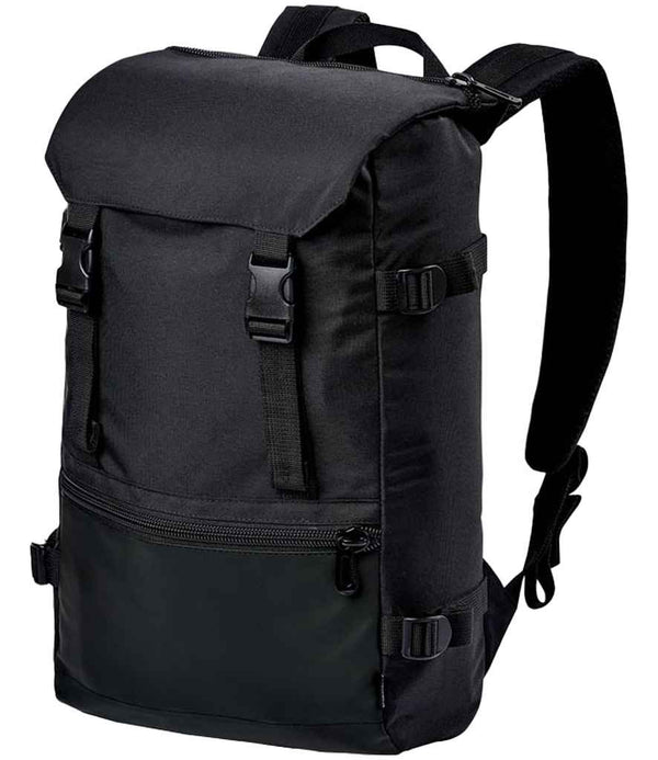 The Stormtech Chappaqua Backpack by Stormtech is a black, laptop-compatible bag with a top flap, dual buckle straps, ergonomic shoulder straps, side compression straps, and a front zip pocket. Its rectangular minimalist design adds style and function.