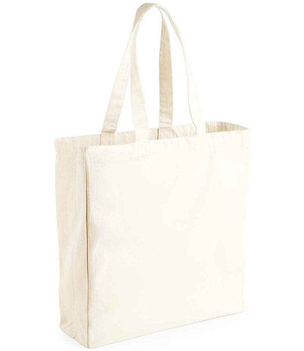 The Westford Mill Canvas Classic Shopper by Westford Mill is an off-white tote bag with two carry straps, unadorned and empty, shown upright on a white background. It features a 20-litre capacity and no visible logos or designs.