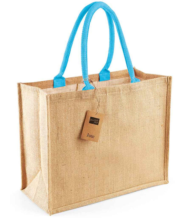 The Westford Mill Jute Classic Shopper by Westford Mill is a rectangular tote bag with blue 55cm handles, a brown Jute tag, a natural textured look, and a spacious 21L capacity.