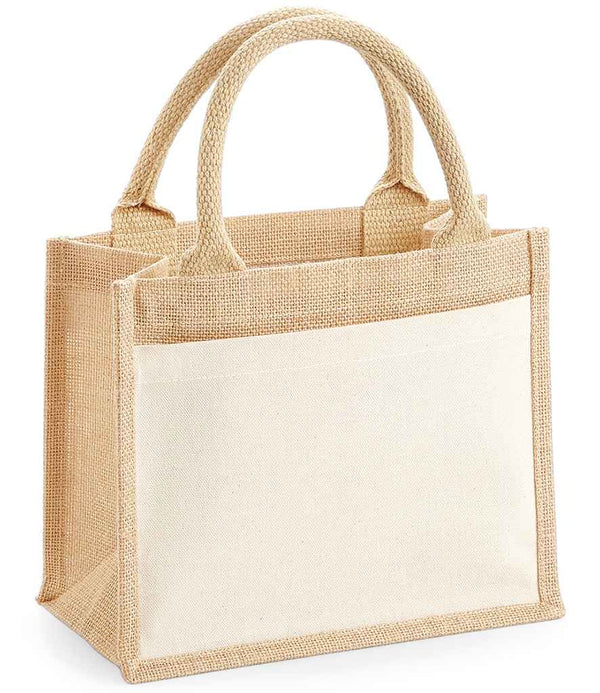 The Westford Mill Pocket Jute Gift Bag by Westford Mill is a beige canvas tote with a burlap texture, sturdy cotton handles, a front canvas pocket, and 6L capacity. It stands upright on a white background.