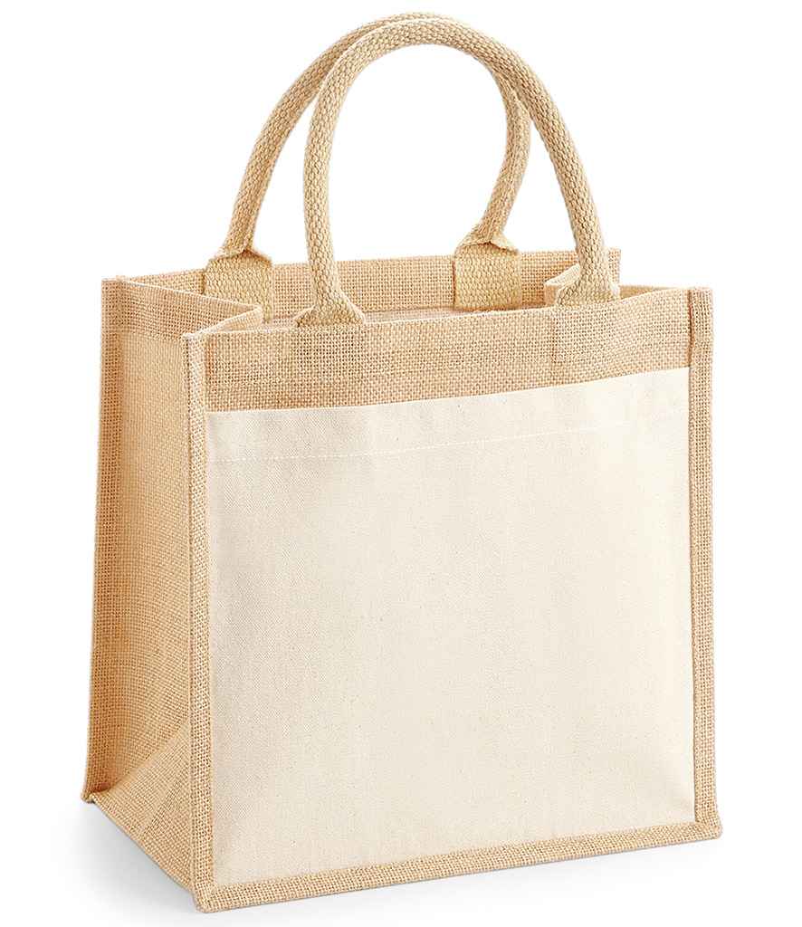 The Westford Mill Pocket Jute Midi Tote Bag by Westford Mill is a beige cotton canvas tote with sturdy jute sides, cotton handles, a large cream front pocket, and 14L capacity. It stands upright on a white background.