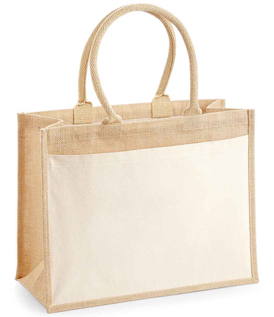 The Westford Mill Pocket Jute Shopper by Westford Mill is a beige rectangular tote with sturdy handles, a large front pocket, and 21L capacity. Made from cotton canvas and jute, it stands upright when empty.