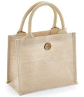 The Westford Mill Juco Mini Gift Bag by Westford Mill is a beige, rectangular jute-cotton tote with sturdy cotton handles, a wooden button closure, textured natural look, stands upright, and has a practical 6L capacity.