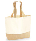 The Westford Mill Jute Base Canvas Tote Bag by Westford Mill features a beige and off-white canvas body, two sturdy cotton webbing straps, and a laminated jute base, shown standing upright on a white background.