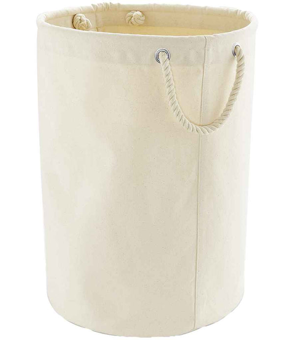 The Westford Mill Heavy Canvas Storage Trug by Westford Mill is a beige, cylindrical storage bag with two rope handles through metal grommets near the top, shown empty and upright against a white background.