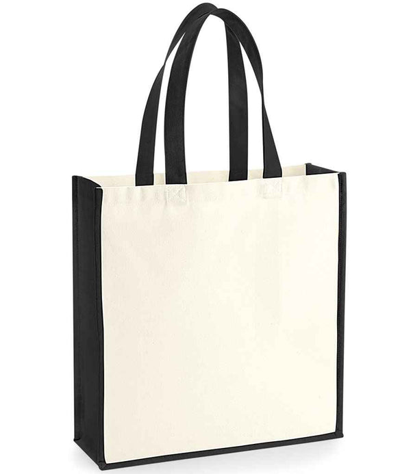 The Westford Mill Gallery Canvas Tote by Westford Mill features black handles and trim, a cream-colored heavyweight canvas body, 19L capacity, and stands upright—perfect for carrying your daily essentials.
