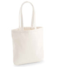 The Westford Mill EarthAware® Organic Spring Tote Bag is an off-white canvas tote with two long shoulder straps, made from heavyweight fabric. Featuring a plain design, it stands upright against a white background with no visible logos or patterns.