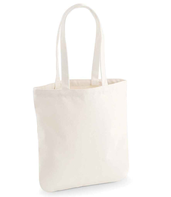 The Westford Mill EarthAware® Organic Spring Tote Bag is an off-white canvas tote with two long shoulder straps, made from heavyweight fabric. Featuring a plain design, it stands upright against a white background with no visible logos or patterns.