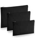 Three Westford Mill EarthAware® Organic Accessory Pouches are arranged in a staggered row on a white background. Each features a visible zip closure with pull tab and is crafted from premium heavyweight fabric.