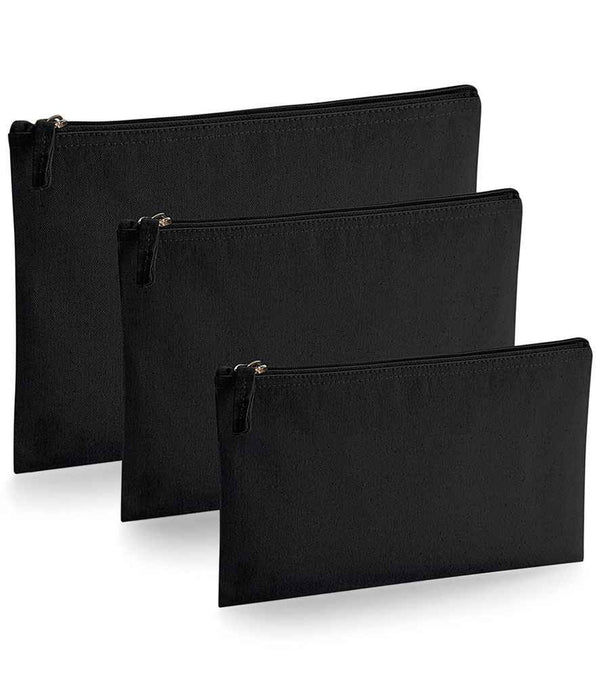 Three Westford Mill EarthAware® Organic Accessory Pouches are arranged in a staggered row on a white background. Each features a visible zip closure with pull tab and is crafted from premium heavyweight fabric.