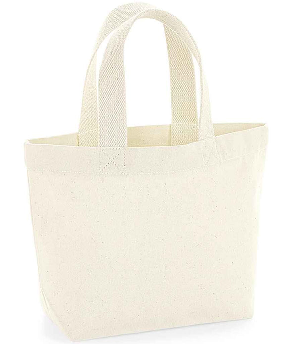 The Westford Mill EarthAware® Organic Marina Mini Tote Bag is a small, plain off-white canvas bag with two short cotton webbing handles, made from heavyweight fabric. Stands upright, holds 4 litres. Brand: Westford Mill.