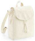 The Westford Mill EarthAware® Organic Mini Rucksack by Westford Mill is an off-white heavyweight canvas backpack with a flap and rope drawcord closure, adjustable shoulder straps, and a top handle.