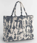 The Westford Mill Tie Dye Canvas Tote Bag by Westford Mill features a large size, two shoulder straps, and a gray/off-white tie dye pattern, shown against a plain light gray background.