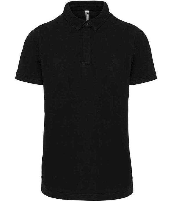 The WK Designed to Work Stud Piqué Polo Shirt by WK Designed To Work is a plain black short-sleeve polo with a ribbed collar and two-button placket, free of visible logos or designs, shown against a white background.