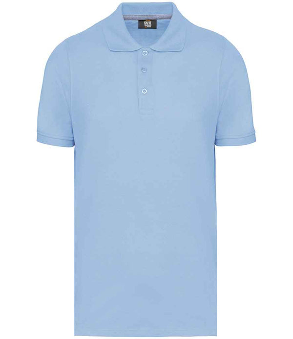 The WK Designed to Work Anti-Bacterial Piqué Polo Shirt by WK Designed To Work is a plain light blue, short-sleeve polo featuring a ribbed collar and three buttons, made from soft piqué knit, shown on a white background.